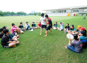 (File) RMIT Vietnam students practice frisbee at the Saigon South Campus, Ho Chi Minh City