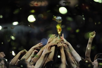 Japan’s players celebrate with the trophy after the final Japan vs USA on July 17, 2011 in Frankfurt am Main, western Germany. Japan won 3-1 in a penalty shoot-out.