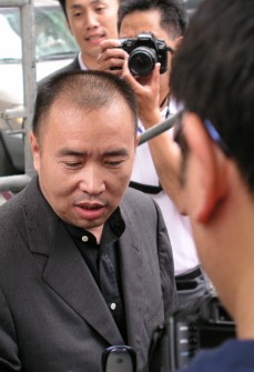 In this dated June 1, 2006 filed photo shows Chinese fugitive Lai Changxing speaking to reporters in Vancouver, Canada. China's most-wanted fugitive, Lai Changxing, took part in illegal gambling and loan sharking activities in 2009 in this west coast city, a Canadian police officer testified July 18, 2011