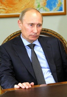 Russian Prime Minister Vladimir Putin attends a meeting at his office in the Novo-Ogaryovo residence, outside Moscow, on July 18, 2011.