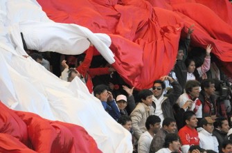 AFP - Peruvian fans celebrate at the end of the third-place match against Venezuela of the 2011 Copa America football tournament