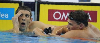 AFP - Phelps (L) and US swimmer Ryan Lochte gesture after they competed in the final of the men's 200-metre freestyle swimming event in the FINA World Championships at the indoor stadium of the Oriental Sports Center in Shanghai on July 26, 2011. Lochte won the race as Phelps won silver.