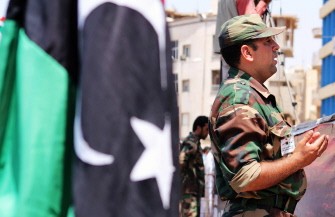 A Libyan rebel prays on the first Friday noon prayer of the Muslim holy month of Ramadan in the Libyan rebel stronghold of Benghazi on August 5, 2011.
