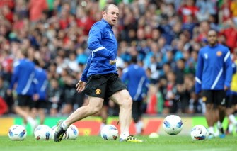 AFP - Manchester United forward Wayne Rooney takes part in a public training session at Old Trafford in Manchester on August 6, 2011. United take on Manchester City in the Charity Shield at Wembley on August 7.