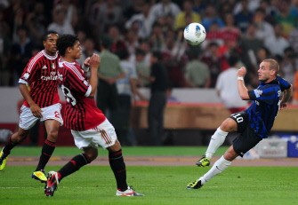 AFP - Inter Milan's Wesley Sneijder (R) competes with AC Milan during the Italian Super Cup 2011 football match at China's National Stadium