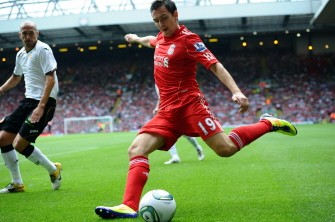 AFP - Liverpool's English midfielder Stewart Downing (R) makes his home debut during the pre-season friendly football match between Liverpool and Valencia at Anfield, Liverpool on August 6, 2011