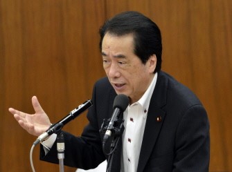 AFP - Japanese Prime Minister Naoto Kan attends the Lower House's fiscal and monetary policies committee session at the national Diet in Tokyo on August 10, 2011