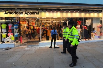 AFP - The clean-up process begins in Manchester City Centre, in north-west England, on August 10, 2011, following a fourth night of violence in Britain.
