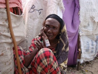 Turkana women sit as they eat wild fruits in Kalokutanyang in northwest Turkana, on August 9, 2011