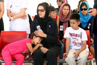 Relatives of major Yavuz Basayar attend his funeral ceremony in Ankara on August 19, 2011. Kurdish rebels killed eight Turkish soldiers, including Basayar, and a village guard on August 17 in an ambush in the southeast of the country. Since the attack Turkish jets bombed 88 targets on bases of the Kurdistan Workers' Party (PKK) in northern Iraq