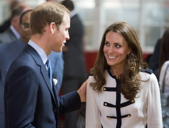 AFP - Britain's Catherine, the Duchess of Cambridge (R) talks her husband Prince William as they visit the Summerfield Community Centre, in Birmingham, central England, on August 19, 2011, following riots in the area last week.