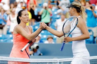AFP - Jelena Jankovic of Serbia congratulates Maria Sharapova after their match