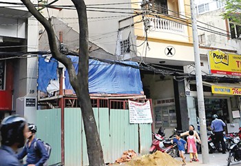 Former headquarters of Dan Chung Newspaper (x) have made way for a new six floor building on Le Thi Hong Gam Street, District 1, HCMC (Photo: SGGP)