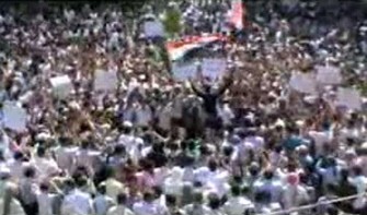AFP - An image grab from footage uploaded on YouTube and dated September 1, 2011 shows Syrian protesters demonstrating against President Bashar al-Assad's regime in the flashpoint Damascus suburb of Duma