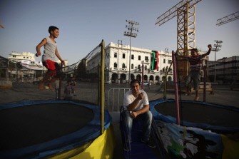 AFP - Libyan boys jump on trampolines set up close to Tripoli's Martyr's Square on September 3, 2011, as a special envoy for UN Secretary General Ban Ki-moon arrived in the capital as the international body and Libya's new leaders stepped up efforts to bring order to the country.