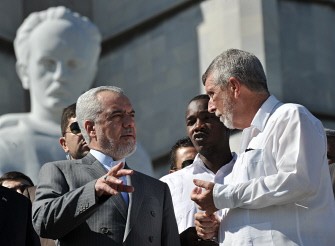 Iran Vice-President Mohammad Reza Rahimi (L) talks with Cuban Vice-Foreign Minister, Marcos Rodriguez (2-L), during the wreath-laying ceremony at the Jose Marti Monument on Revolution Square in Havana, on September 7, 2011. Rahimi arrived in Cuba on an official visit.