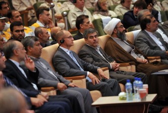 Iranian Foreign Minister Ali Akbar Salehi (L), Head of the Russian nuclear agency (Rosatom) Sergei Kiriyenko (3rd L) and the head of the Iranian Atomic Energy Organization Fereydoun Abbasi Davani (3rd R) attend a ceremony in the southern port city of Bushehr on September 12, 2011