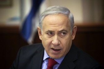 AFP - Israeli Prime Minister Benjamin Netanyahu (C) speaks during the weekly cabinet meeting in Jerusalem on September 18, 2011.