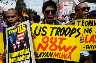 AFP - Protesters shout anti-US slogan during a rally near the US embassy in Manila on September 16, 2011. Protesters are calling for an end to the Visiting Forces Agreement as part of the 20th year commemoration of the closing down of US bases in the country.
