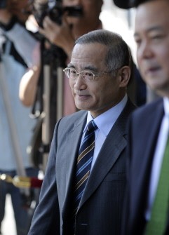 South Korea's chief nuclear envoy Wi Sung-Lac leaves his hotel for a meeting with his North Korean counterpart Ri Yong-Ho in Beijing on September 21, 2011