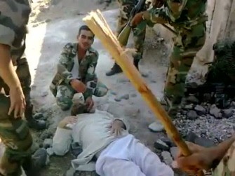 An image grab from footage made available on YouTube on September 22, 2011 shows what is described by anti-regime activists as the torture by Syrian government forces of a martyr named Louai al-Amer in al-Hula in the Syrian flashpoint province of Homs on August 13, 2011.