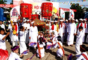 (File) Costumes of the Po Sah Inu Goddess being carried on a palanquin.