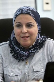 Egyptian political activist Israa Abdel Fattah, a potential candidate for the Nobel Peace Prize, sits at her office in Cairo on October 2, 2011.
