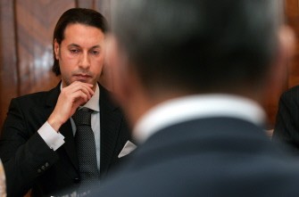 A file picture taken on October 29, 2008 shows Mutassim Kadhafi (L), a son of Libya's former leader, meeting Russian Foreign Minister Sergei Lavrov in Moscow.