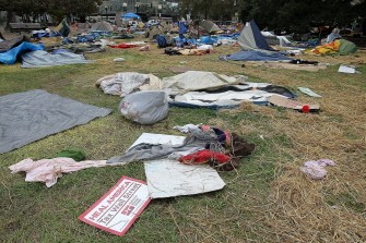 AFP - A sign sits in the remains of the Occupy Oakland camp after police shut the encampment down on October 25, 2011 in Oakland, California.