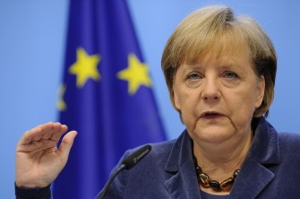 German Chancellor Angela Merkel gestures during a press conference held at the end of a Eurozone summit at the Justus Lipsius building, EU headquarters in Brussels, on October 27, 2011.