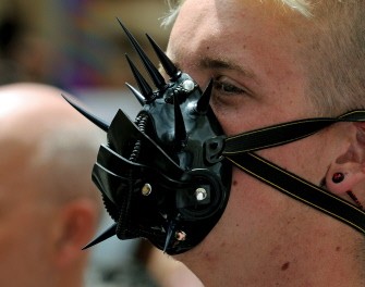 AFP - A protester wears a mask during a demonstration at the opening of the Commonwealth Heads of Government Meeting in Perth on 28 October 2011.