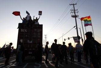 AFP - Occupy Oakland protesters gather at the Port of Oakland to shut down the facility as they call for a citywide general strike on November 2, 2011 in California.