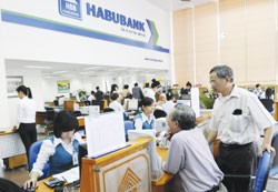 Customers making transactions at Habubank. A law on deposit insurance will be introduced to rectify shortcomings in the current system