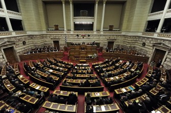 AFP - Greek Prime Minister Lucas Papademos speaks at the parliament in Athens on November 16, 2011.