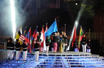 AFP - Rita Subowo, chairwoman of Indonesia's SEA GAMES organising committee (Inasoc) hands over the SEAGAMES federation flag to the Myanmar mission during the closing ceremony of the 26th Southeast Asian Games in Palembang