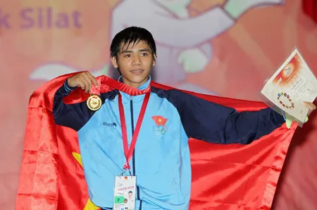 Võ sĩ Võ Duy Phương giành HCV đầu tiên trong ngày 17-11 cho Đoàn thể thao Việt Nam. Ảnh Q.Khánh/TTX