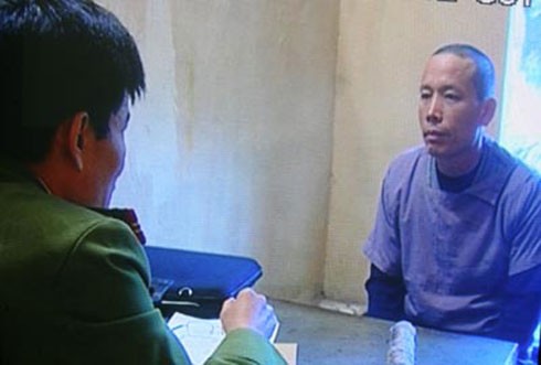 Doan Van Vuon is being interrogated by police. (Photo:VNExpress)