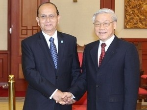 Party General Secretary Nguyen Phu Trong shakes hands with Myanmar President Thein Sein at the Central Office of the Communist Party of Vietnam in Hanoi on March 20, 2012. (Photo: VNA).