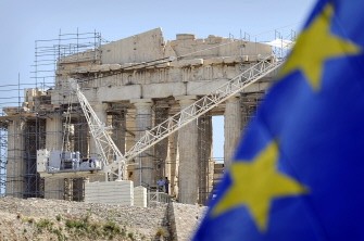 Workers on scaffolding work in front of the Parthenon Temple at the Acropolis archaeological site in Athens on May 9, 2012. Greece remains in a deadlock over forming a new coalition to lead the country and push ahead on severe austerity cuts that were agreed in exchange for international loans.