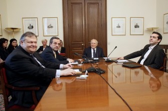 Greek Socialist Party leader Evangelos Venizelos (L),leader of the New Democracy conservatives, Antonis Samaras (L2),leader of the Coalition of the Radical Left party Alexis Tsipras (R) meet with Greek President Carolos Papoulias (C) on May 13, 2012.