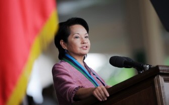 In a file picture taken on June 22, 2010, Philippine President Gloria Arroyo delivers her speech during a testimonial parade for outgoing Armed Forces chief of staff Delfin Bangit (not pictured) at the military headquarters in Manila.