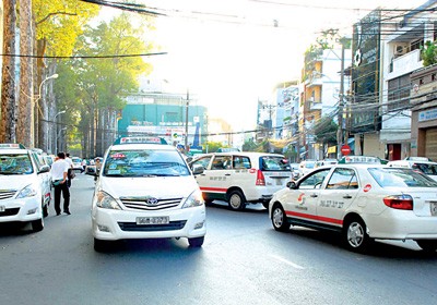 Vinasun Taxi Company has slashed fares by VND500 per kilometre (Photo: SGGP)