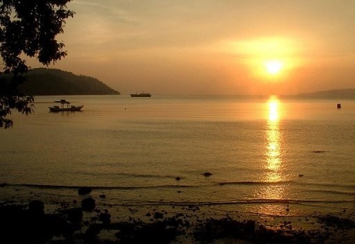 Photo illustration shows a cargo ship anchored off the bay of Ambon, in Indonesia's Maluku province.