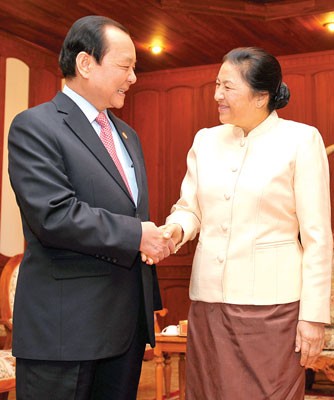 Secretary of the City Party Committee Le Thanh Hai (L) meets with Chairwoman of the Laos’ National Assembly Pani Zathotou (Photo: SGGP)