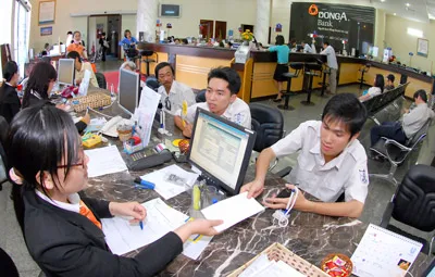 Từ ngày 11-6, trần lãi suất huy động còn 9%/năm