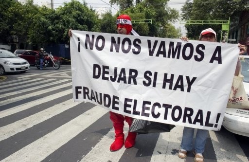 Supporters of the runner up in Mexico's presidential vote, Andres Manuel Lopez Obrador, protest the election results on July 3, in Mexico City.