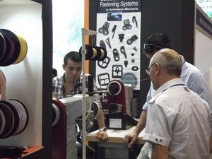 A display booth at the exhibition (Photo: VNA)