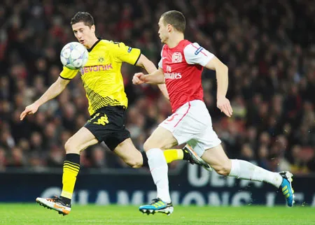 Lewandowski (trái) và các đồng đội Dortmund sẽ phải thi đấu tốt hơn mùa trước