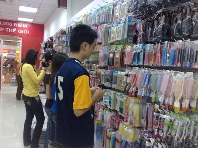 Customers choosing items at a Dollar Store Daiso in Ho Chi Minh City