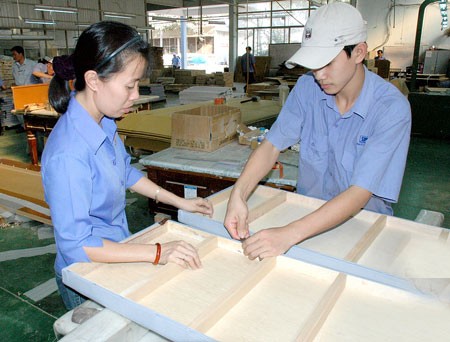 Production of wooden items for export at Satimex Company (Photo: SGGP)